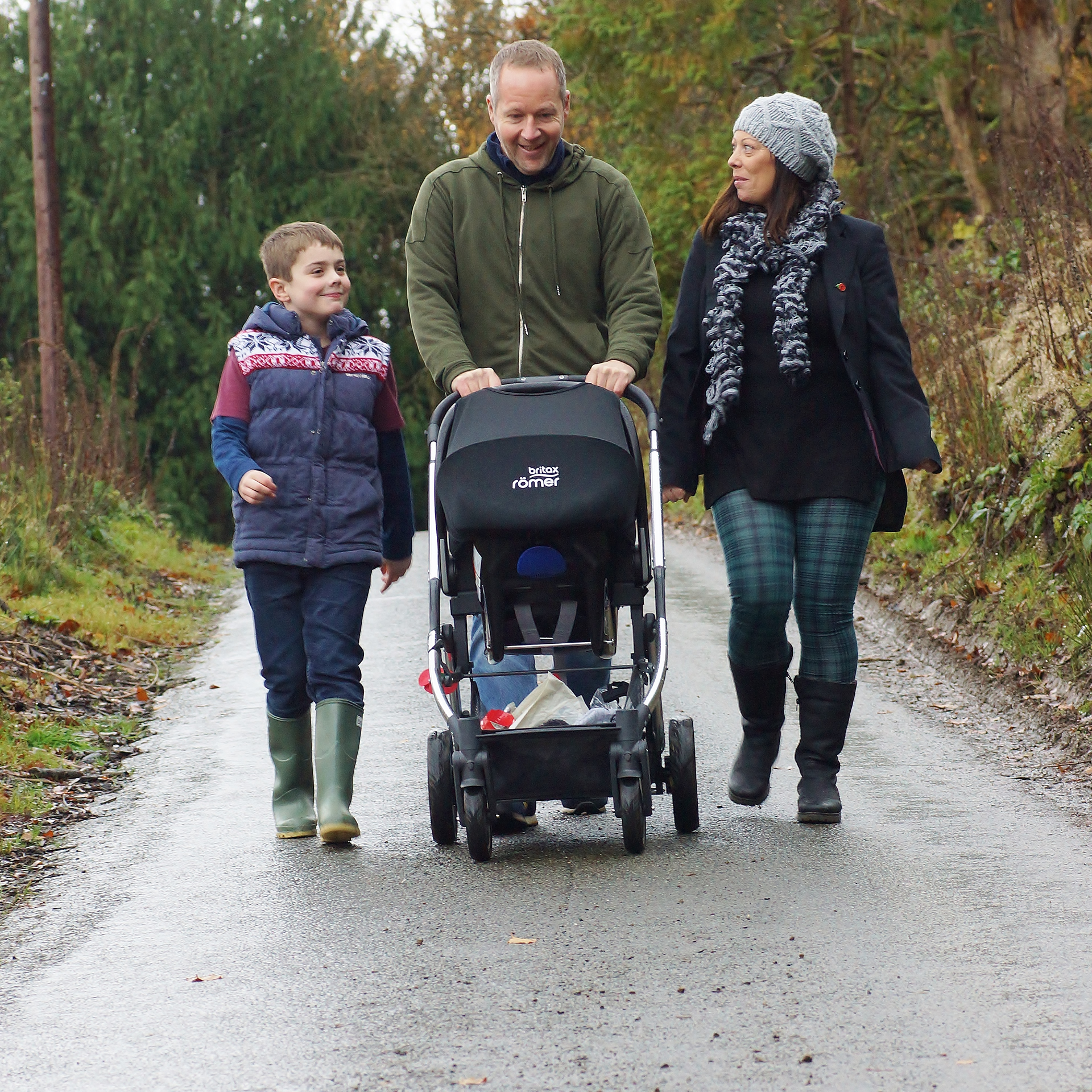 Family walking on a road